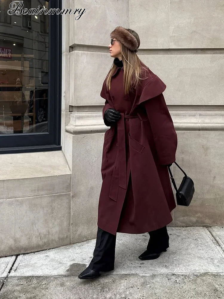 Manteau long bordeaux pour femme, à col cape, à double boutonnage, ceinturé à la taille, coupe-vent ample, pour l'automne et l'hiver.