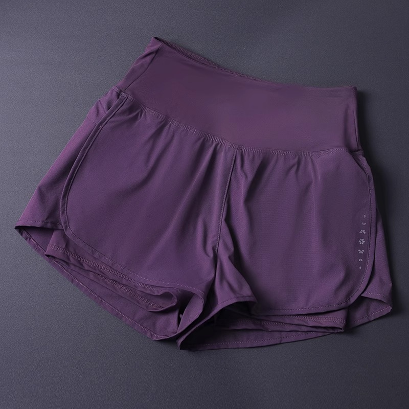 Short 2 en 1 pour femme avec poches – Léger, respirant, ample, anti-exposition, côté fendu pour le yoga, la course à pied, la salle de sport