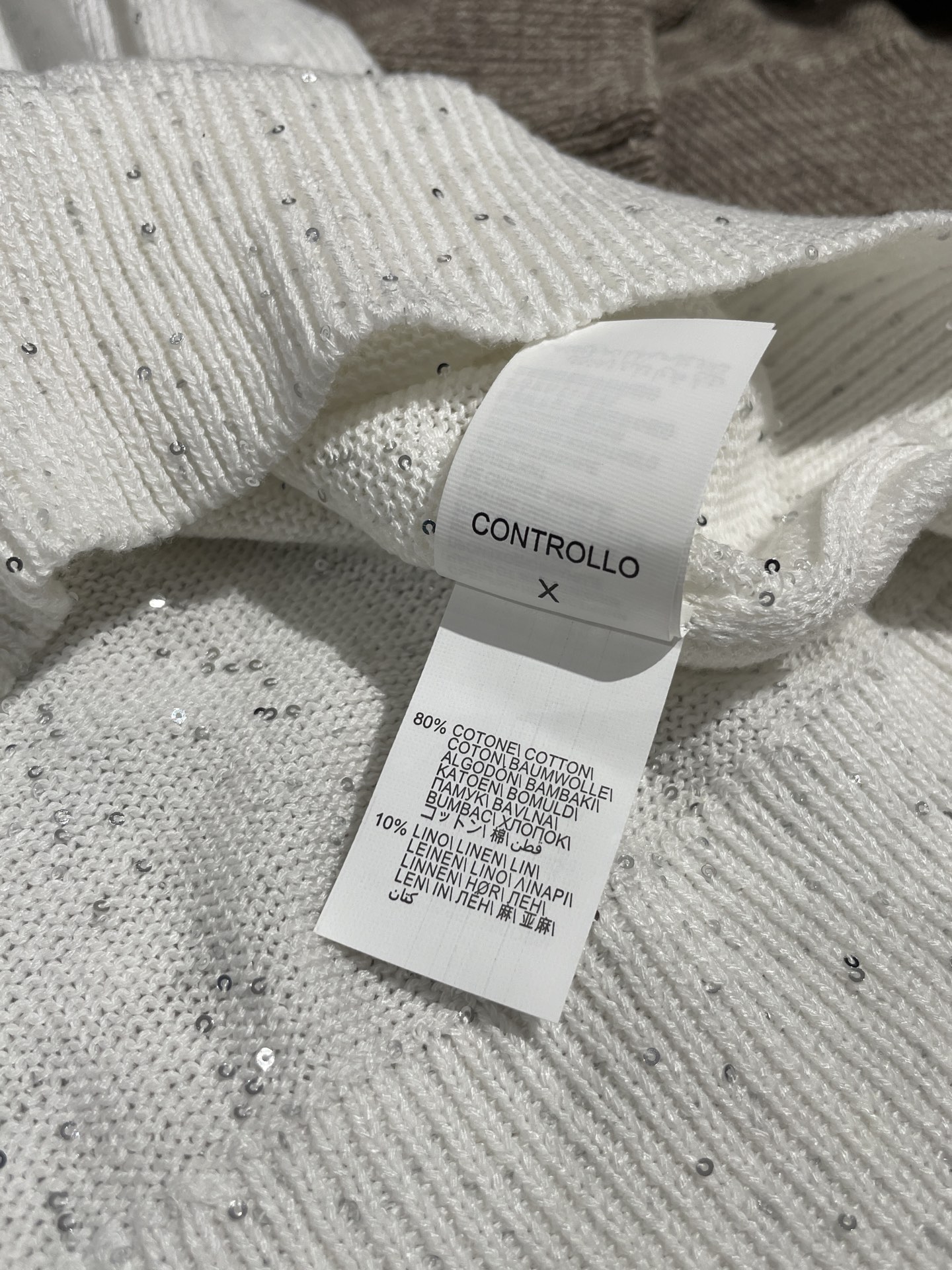 Gilet tricoté sans manches en coton et lin pour femme avec sequins et col en V