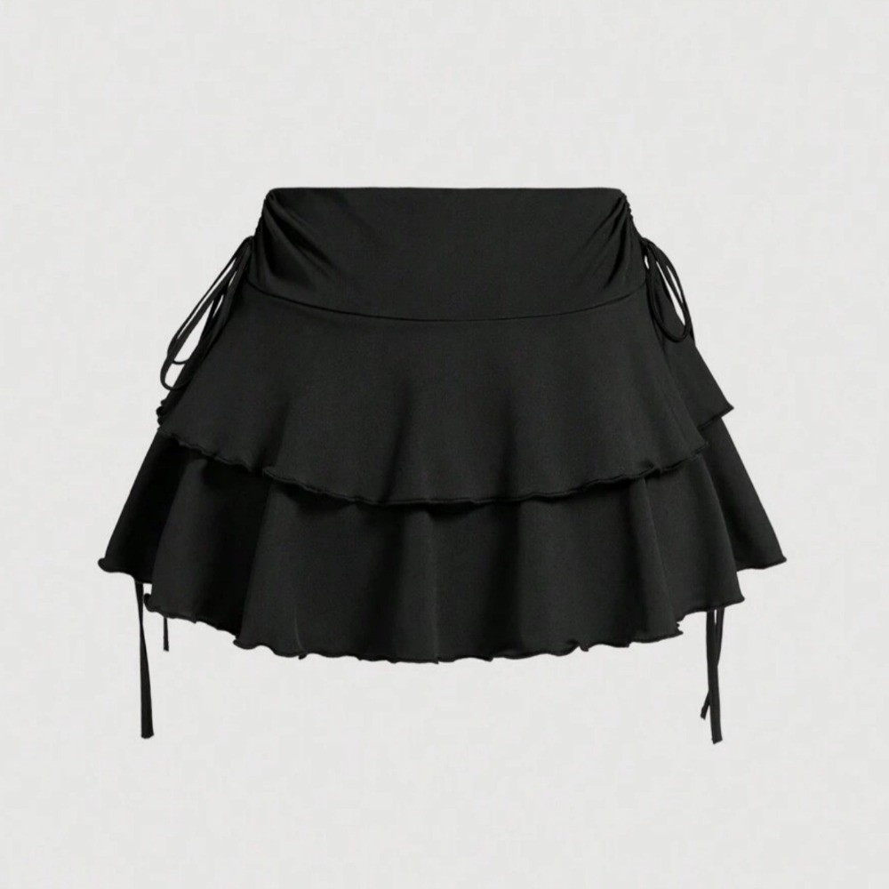 Nouvelle jupe courte élégante, coupe ajustée, couleur unie, jupe à volants, jupe plissée taille haute, mini-jupes pour femmes