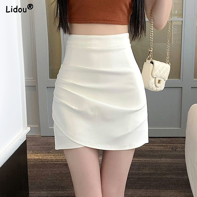 Jupes courtes taille haute pour femmes, jupe plissée élégante, fesses douces et sexy, vêtements maigres et fins, nouvelle mode, document monochrome, été 2023