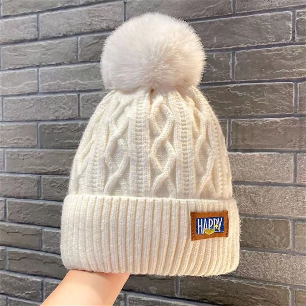Chapeau d'hiver épais élégant garder au chaud bonnet chapeaux casquette tricotée femmes pompons chapeau Protection des oreilles