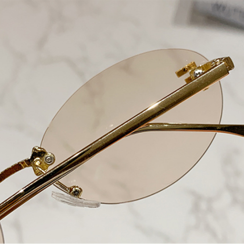 Lunettes de soleil ovales sans monture tendance pour femmes, petite taille, monture en métal, protection UV400, pour les loisirs en plein air et les vacances