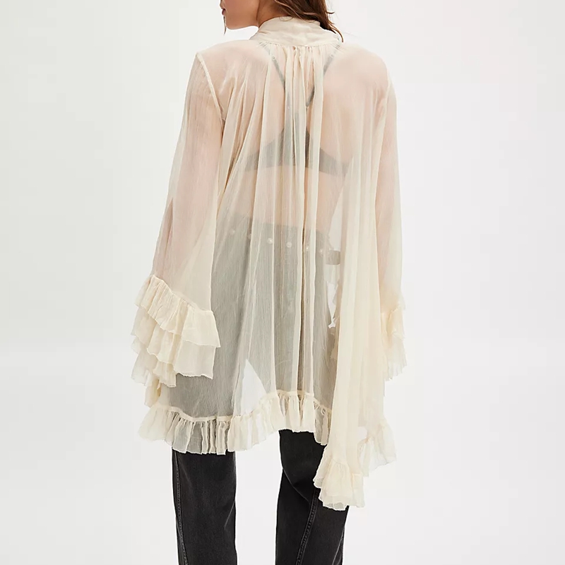 Femmes Chic irrégulière ourlet à volants Cape haut nœud noué cou chemises couleur unie voir à travers coupe ample à manches longues Blouses