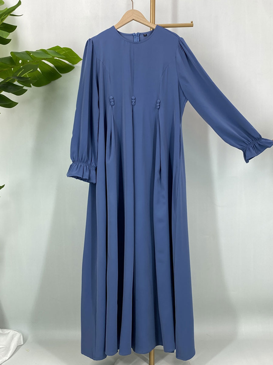 Abaya de style Dubaï modeste, robe maxi islamique tendance pour femmes musulmanes avec détails boutonnés et poches