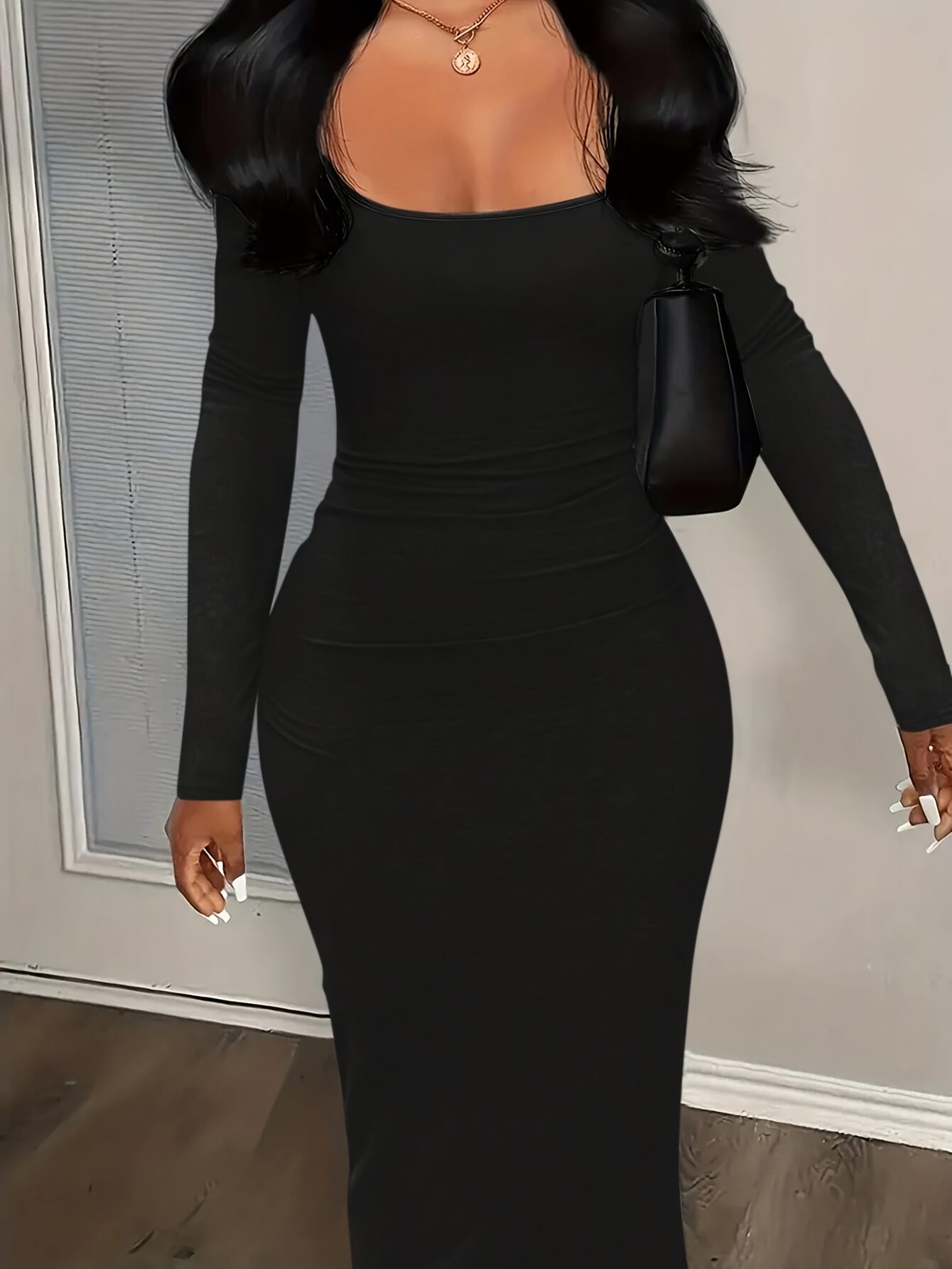 Robe longue élégante à col rond et coupe basse pour femme