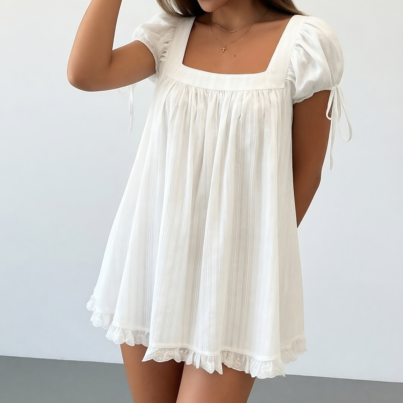 Chemisier ample et fluide pour femme à col carré, manches bouffantes, poignets à nouer, bordure en dentelle, style babydoll, idéal pour l'été et les sorties