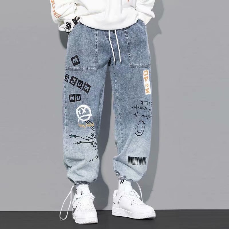 Vêtements coréens hommes lettre imprimé jean taille haute Baggy jean dessin animé Graffiti Hip-Hop pantalon jean bleu