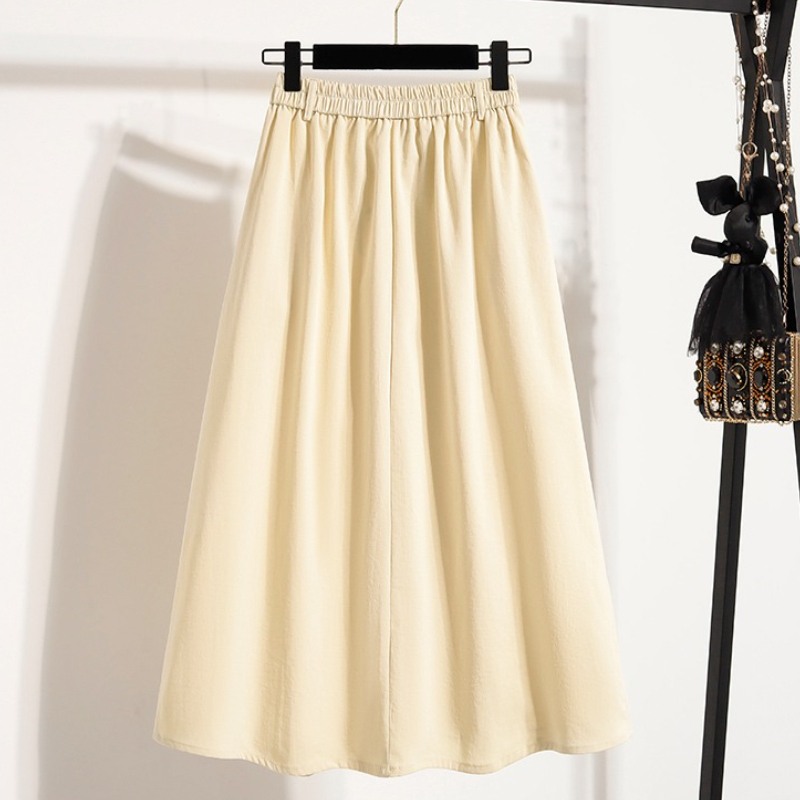 Été femmes grande taille jupe 2026 nouvelle taille haute irrégulière mi-longue jupe femme taille élastique une ligne plissée grande taille jupes