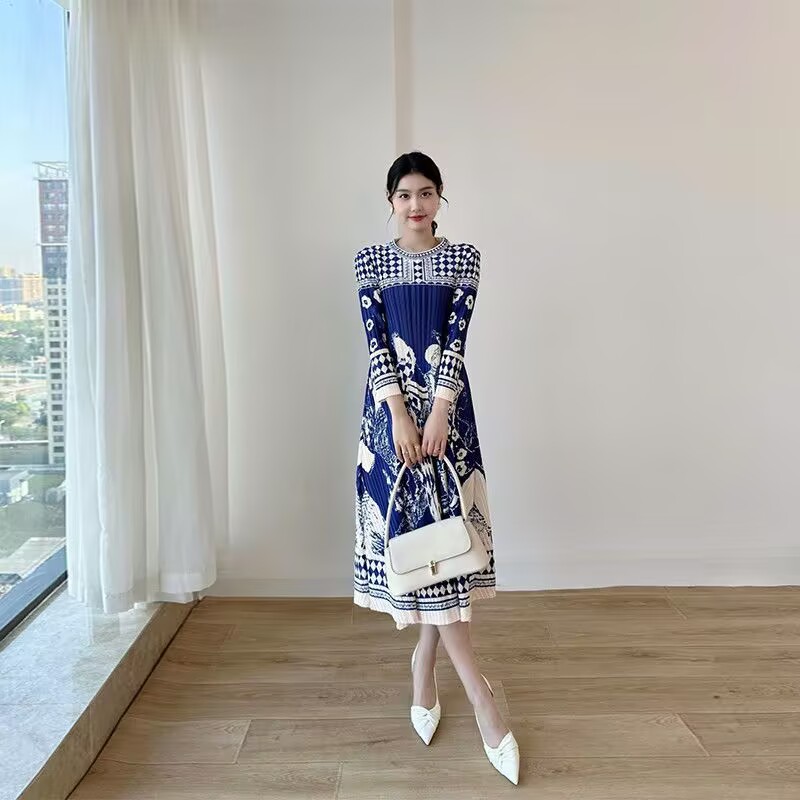 Belles robes pour femmes printemps nouvelle robe pliante ample imprimée avec col rond et manches longues robes longues de tempérament de mode