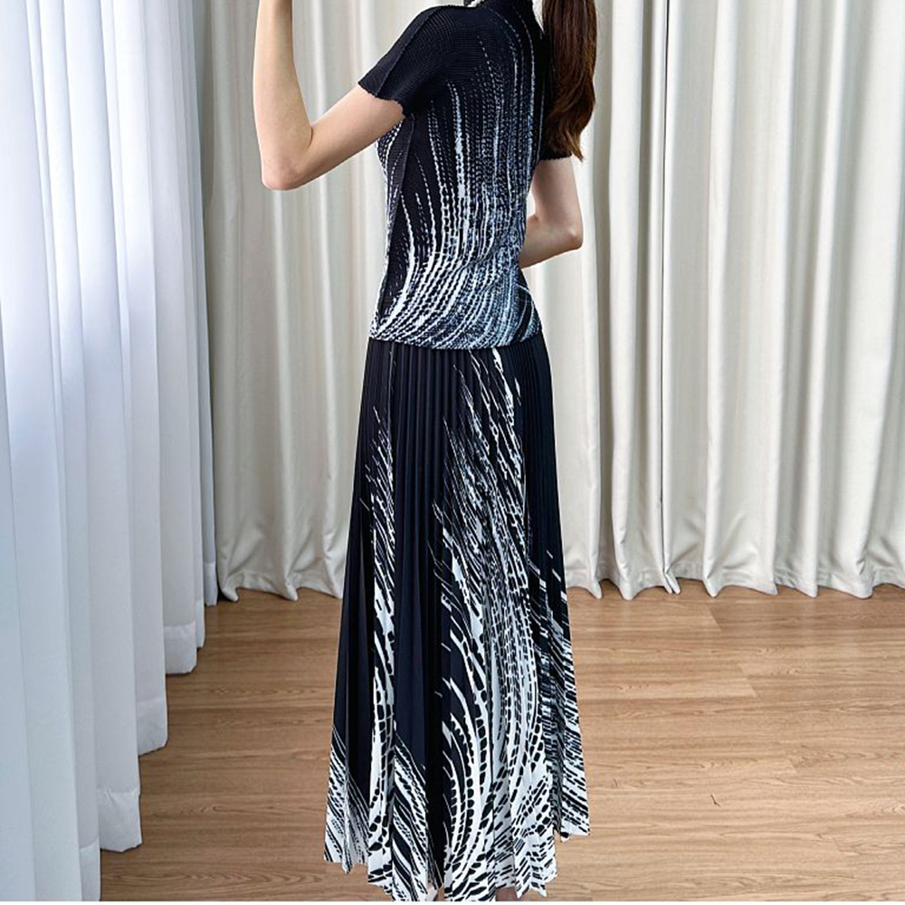 Costume à la mode haut de gamme changement progressif col rond haut à manches courtes jupe plissée aux hanches pour femmes