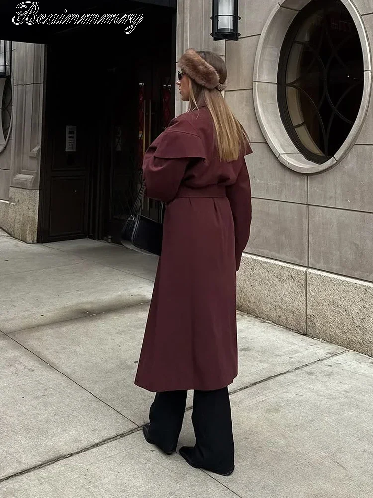 Manteau long bordeaux pour femme, à col cape, à double boutonnage, ceinturé à la taille, coupe-vent ample, pour l'automne et l'hiver.