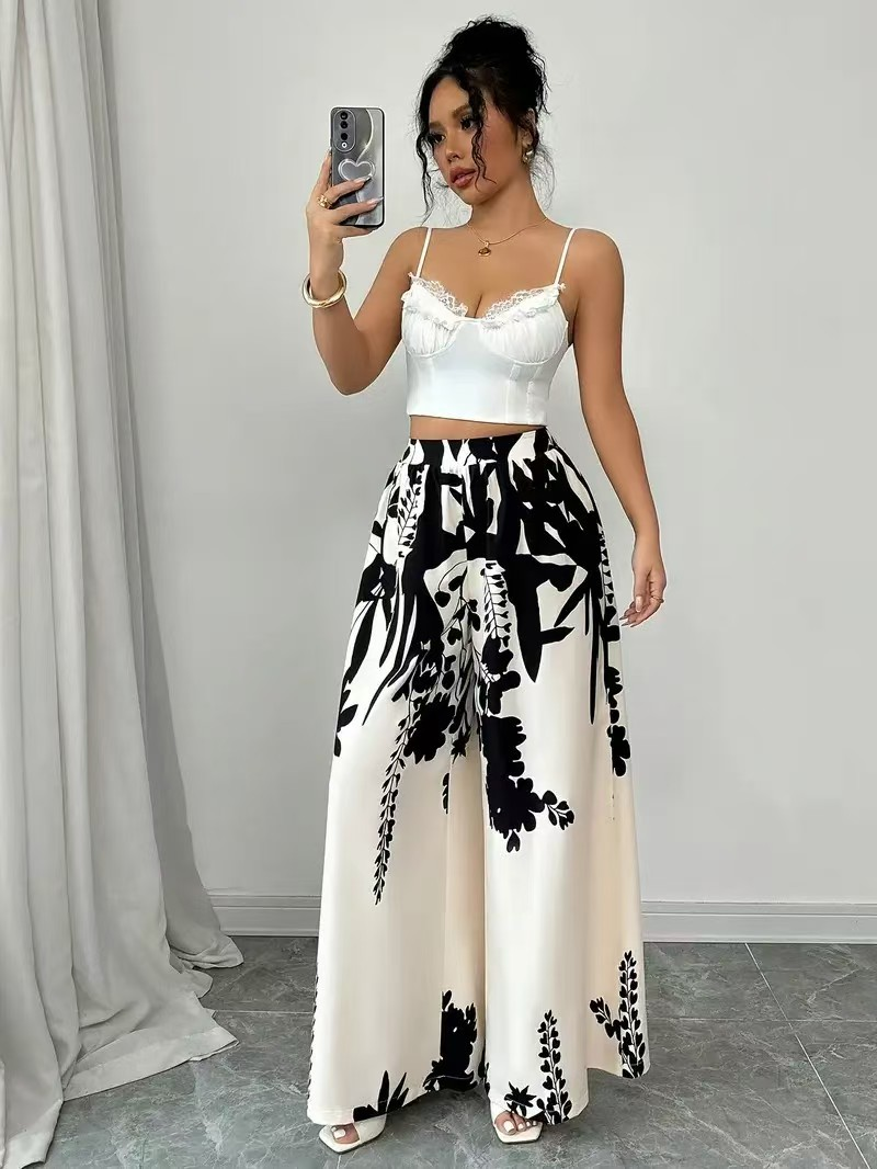 Robes pour femmes, imprimé fleurs noires et blanches, manches longues, col à volants, robe élégante, robe trapèze à lacets, nouvelle collection printemps 2026