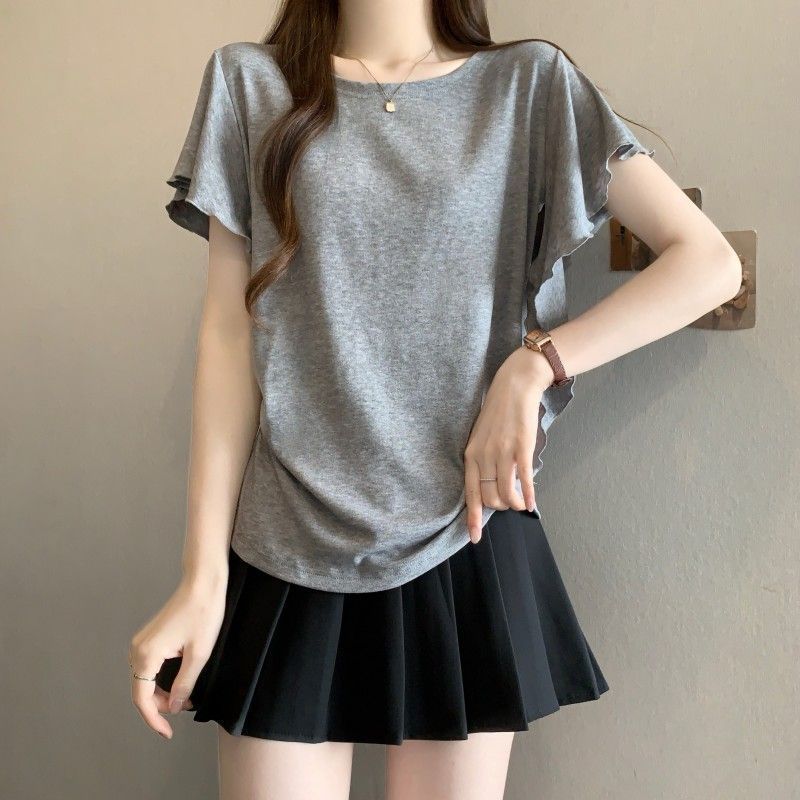 T-shirt d'été pour femmes grandes tailles, nouveau style uni, coupe ample, amincissant, dissimulant les imperfections, à volants irréguliers et manches courtes