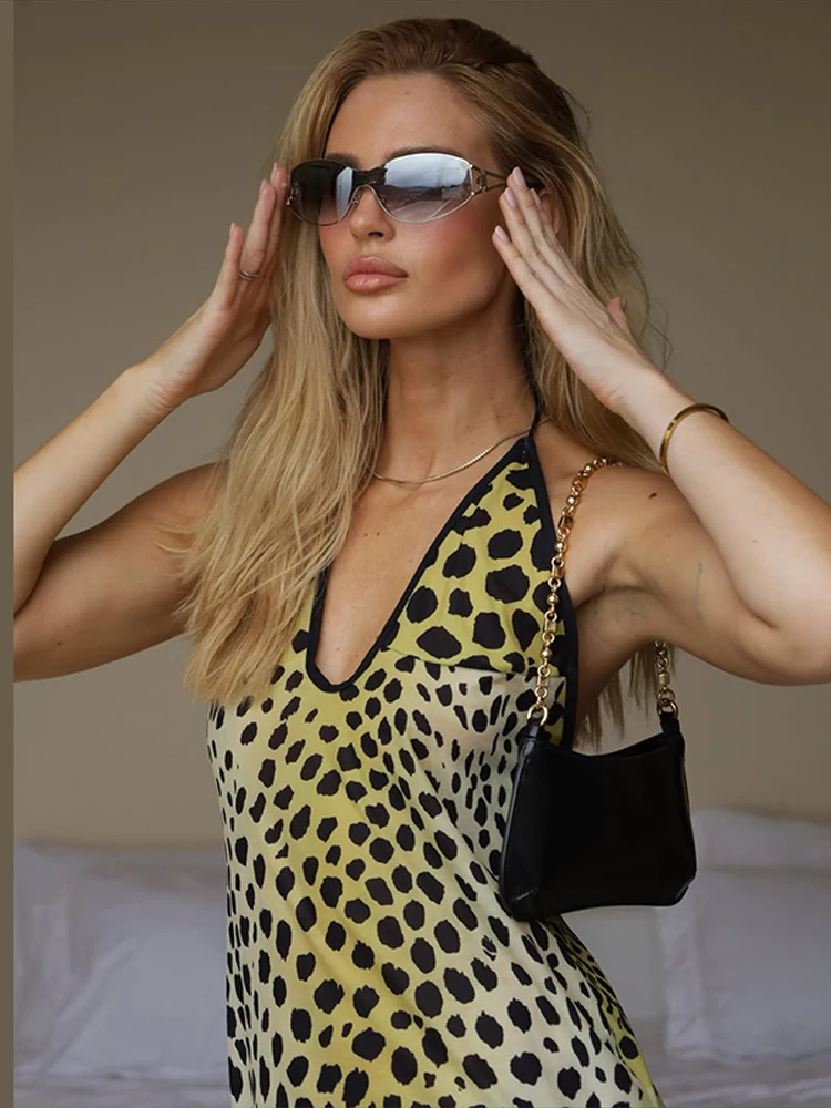 Robe longue asymétrique sans manches à imprimé léopard pour femme, col halter, dos nu, idéale pour les vacances à la plage, tendance et nouvelle arrivée