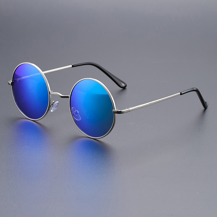 Lunettes de soleil rétro à monture ronde pour la mode ; idéales pour les fêtes, les festivals de musique et la photographie de rue pour un look jeune.