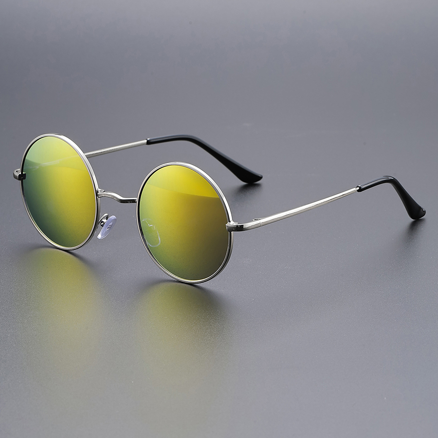 Lunettes de soleil rétro à monture ronde pour la mode ; idéales pour les fêtes, les festivals de musique et la photographie de rue pour un look jeune.