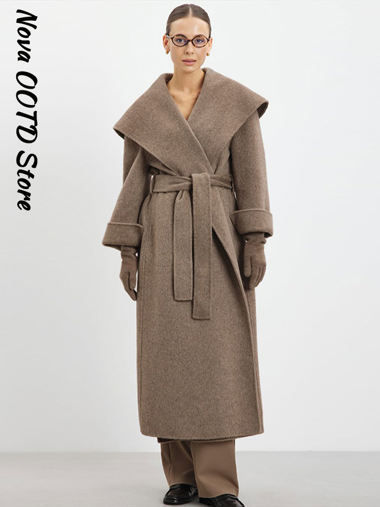 Manteau long en laine élégant à col châle et lacets pour femme, avec ceinture et revers, épais, collection automne-hiver 2026, chic et tendance