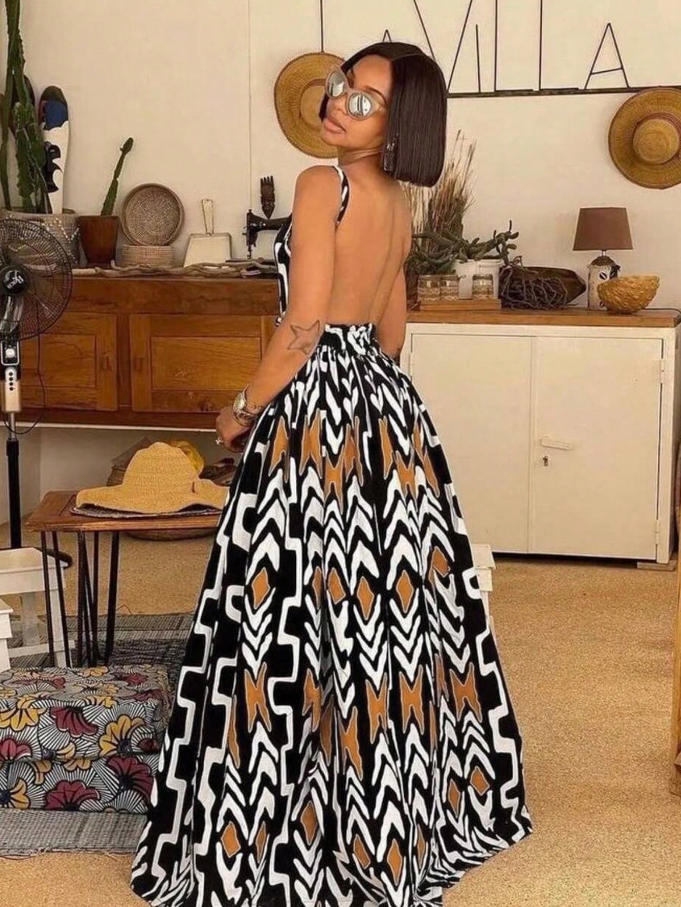 Robe longue maxi sans manches à col en V et dos nu, imprimé africain pour femmes, taille haute, coupe A-line, tenue élégante pour l'été et les fêtes sur la plage.