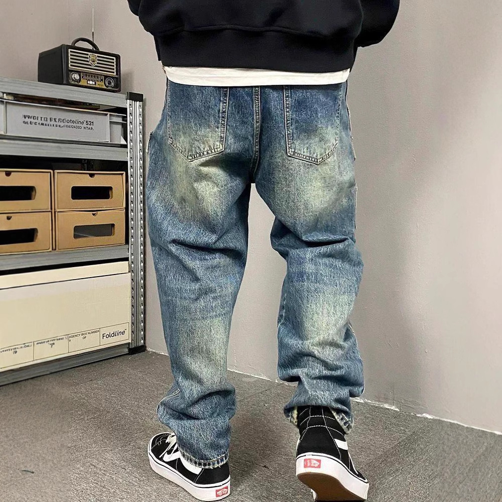 Jeans de travail vintage délavés décontractés américains pour hommes au printemps et en automne, style de rue, pantalons coniques amples.