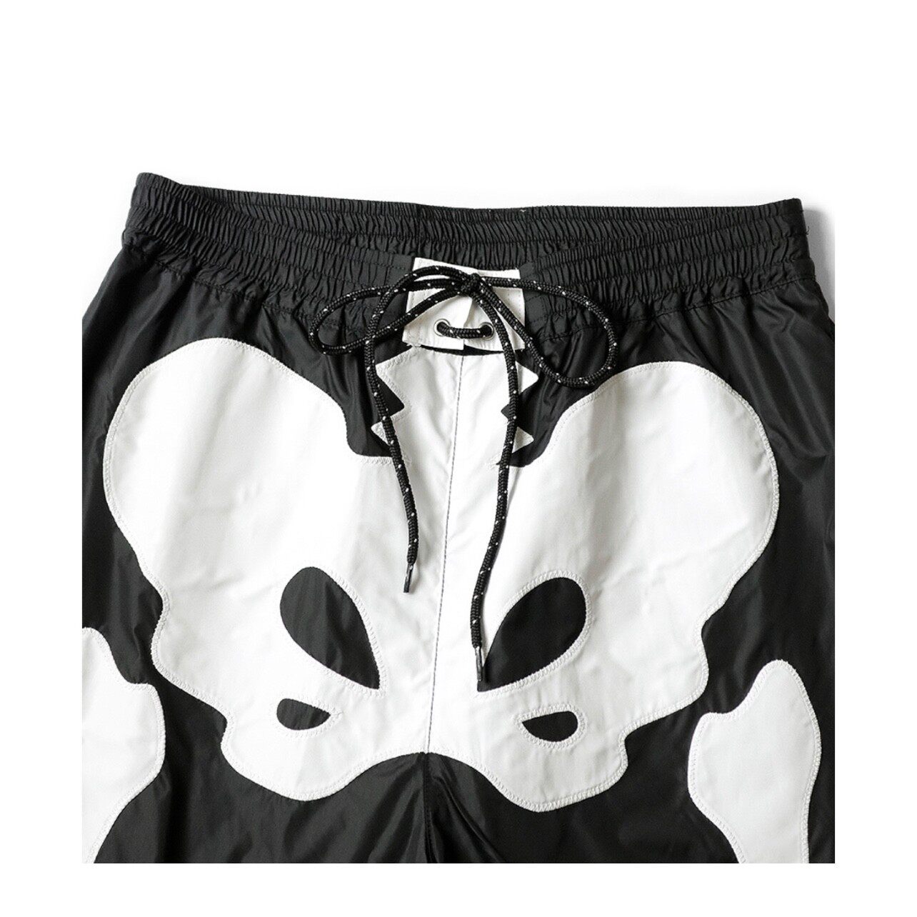 Pantalon décontracté en maille de nylon de style japonais avec taille élastique respirante et design à cinq poches