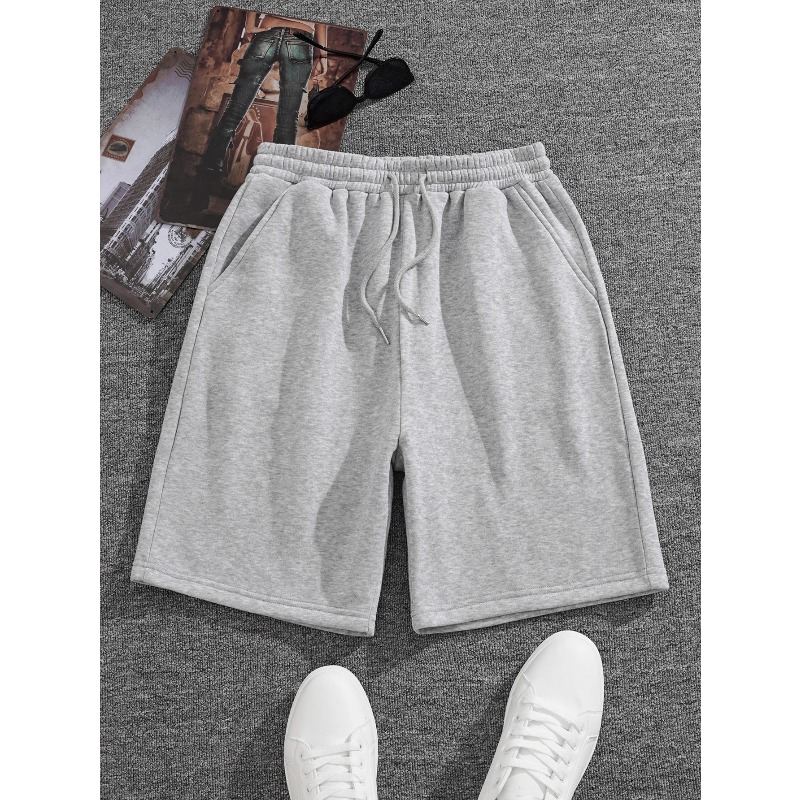 Shorts décontractés pour hommes, noir et blanc, tendance et polyvalents, style sportif. Nouveaux shorts d'été adaptés aux hommes et aux femmes
