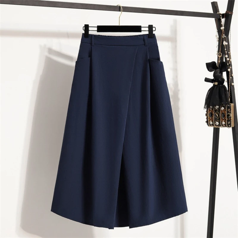 Été femmes grande taille jupe 2026 nouvelle taille haute irrégulière mi-longue jupe femme taille élastique une ligne plissée grande taille jupes