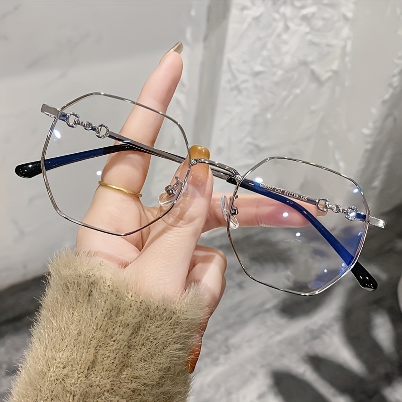Lunettes rondes tendance avec montures métalliques simples et élégantes, verres en PC durables, confortables à porter, adaptées à un usage quotidien