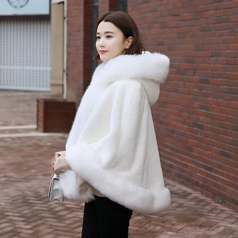 Manteau en fourrure noire pour femmes, nouveau modèle d'hiver, style cape courte, imitation fourrure de renard, coupe-vent épais à capuche, manteau chaud en fausse fourrure pour femme.