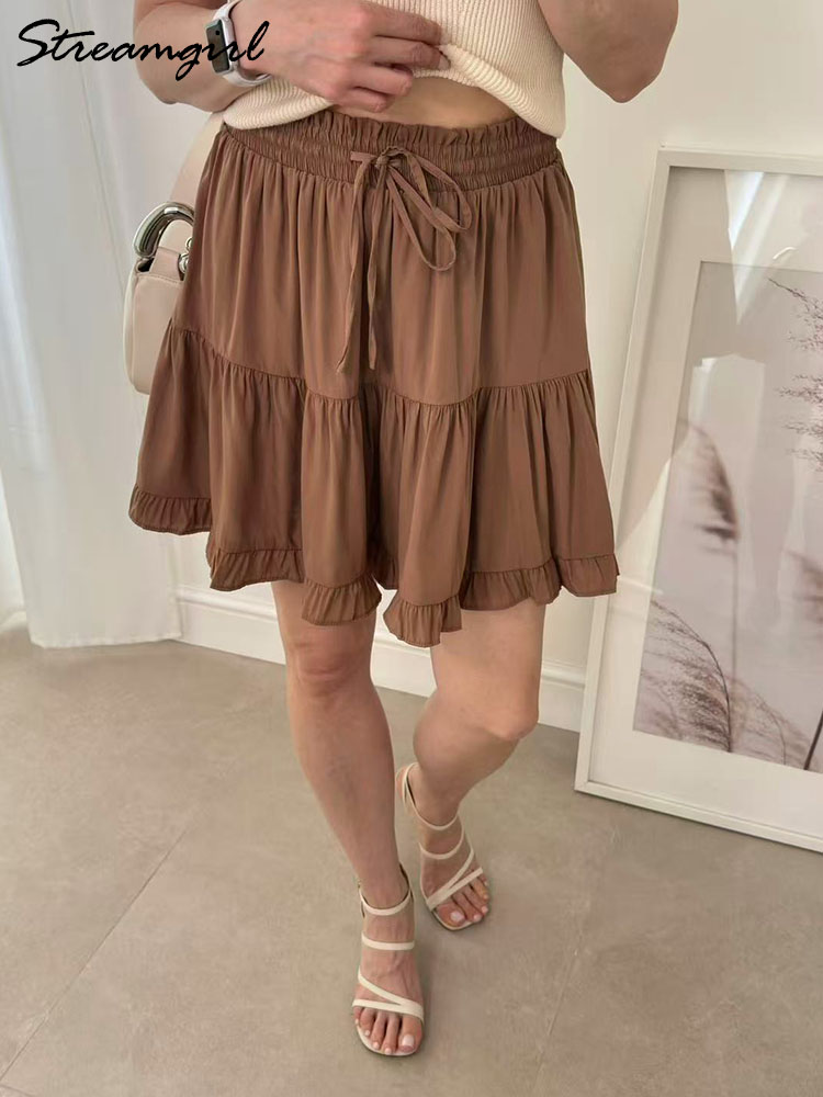 Femmes Mini jupe à volants avec Short été 2025 taille haute blanc gâteau jupe épissage jupes de plage courtes pour les femmes Vintage