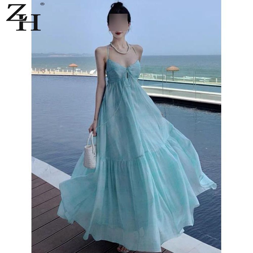 Robe de plage longue à bretelles françaises, style féerique, dos nu, avec nœud, fluide et à volants, idéale pour les vacances à la mer et les pauses thé.