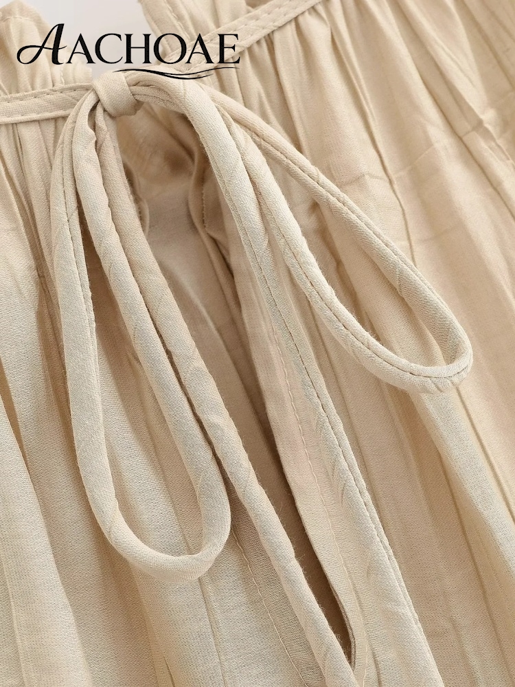 Chemisier plissé bohème perlé à col halter sans manches pour femme, coupe ample, élégant, idéal pour les vacances d'été