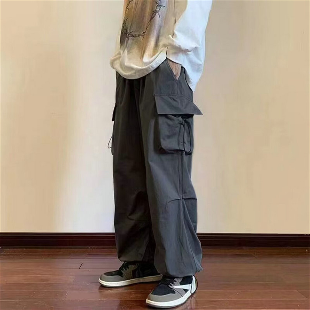 Streetwear 2024 printemps sarouel pantalons décontractés hommes taille élastique couleur unie Cargo pantalon Multi poche ample Baggy pantalon pour les femmes