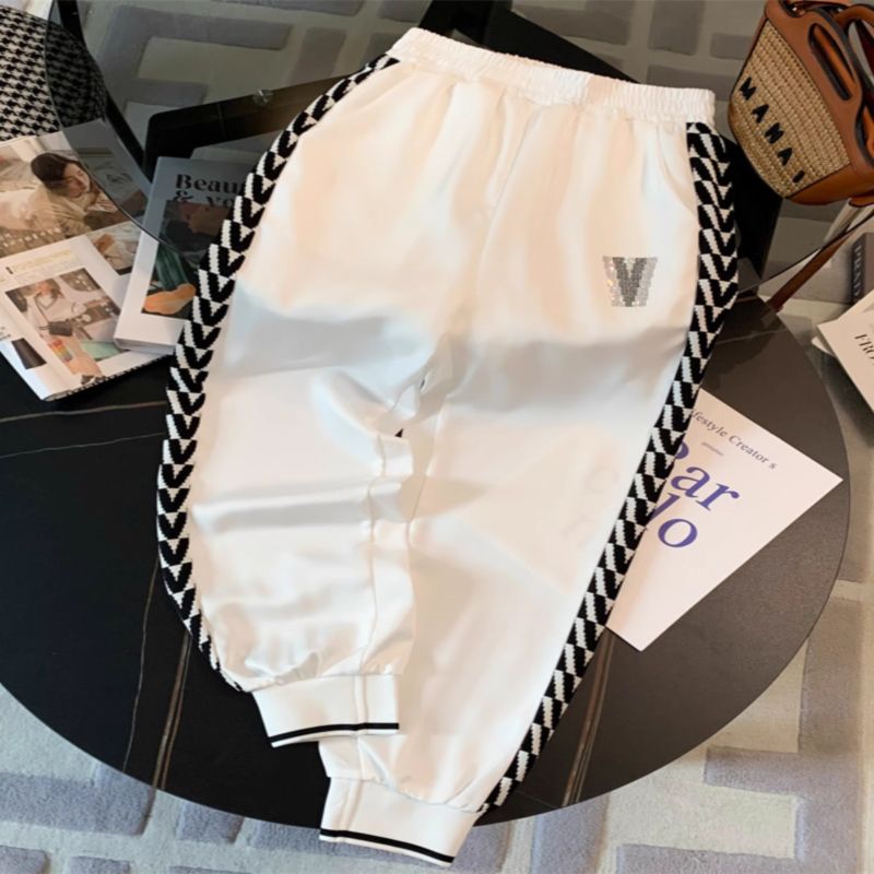 Costume à la mode pour femmes, nouvel article d'été, sensation haut de gamme, réduction de l'âge, manches courtes, pantalon décontracté noué aux jambes, ensemble deux pièces