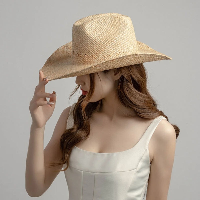 Chapeau en raphia tissé à la main pour femmes, chapeau d'été Simple de Cowboy occidental, chapeau de paille pour dames Ins California Girl, vacances en bord de mer, chapeau de soleil à bord bouclé