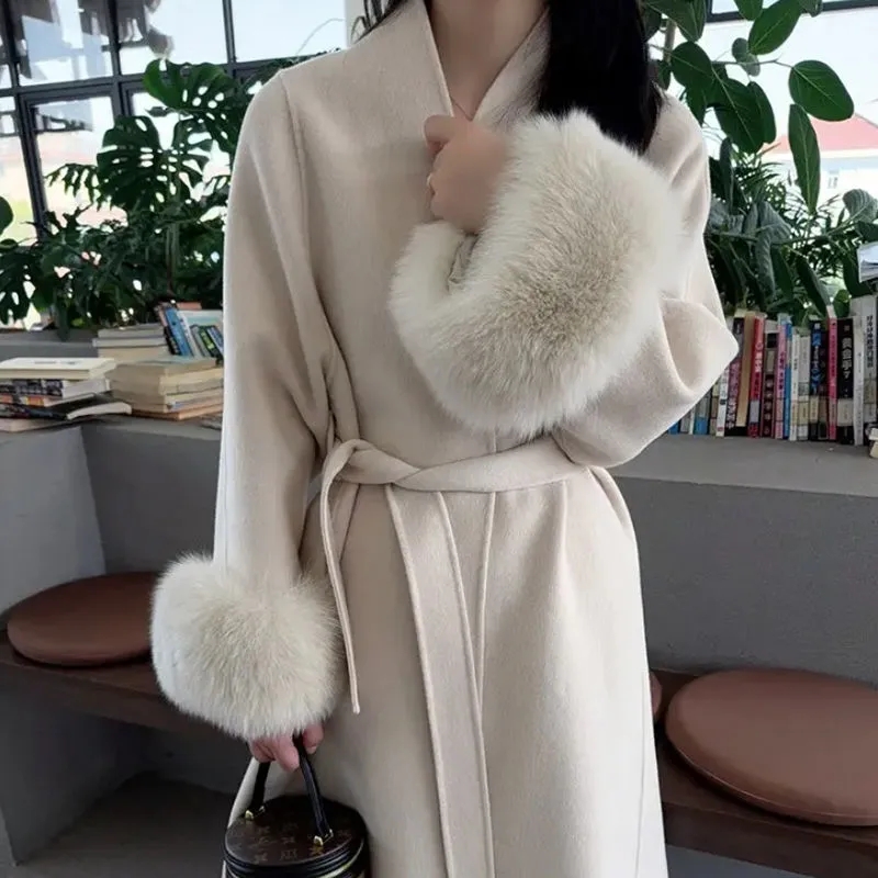 Femmes automne hiver manteau de laine 2025 nouveau haut de gamme Style français manches de fourrure mi-long manteau de laine femmes manteau Long vêtements d'extérieur amples