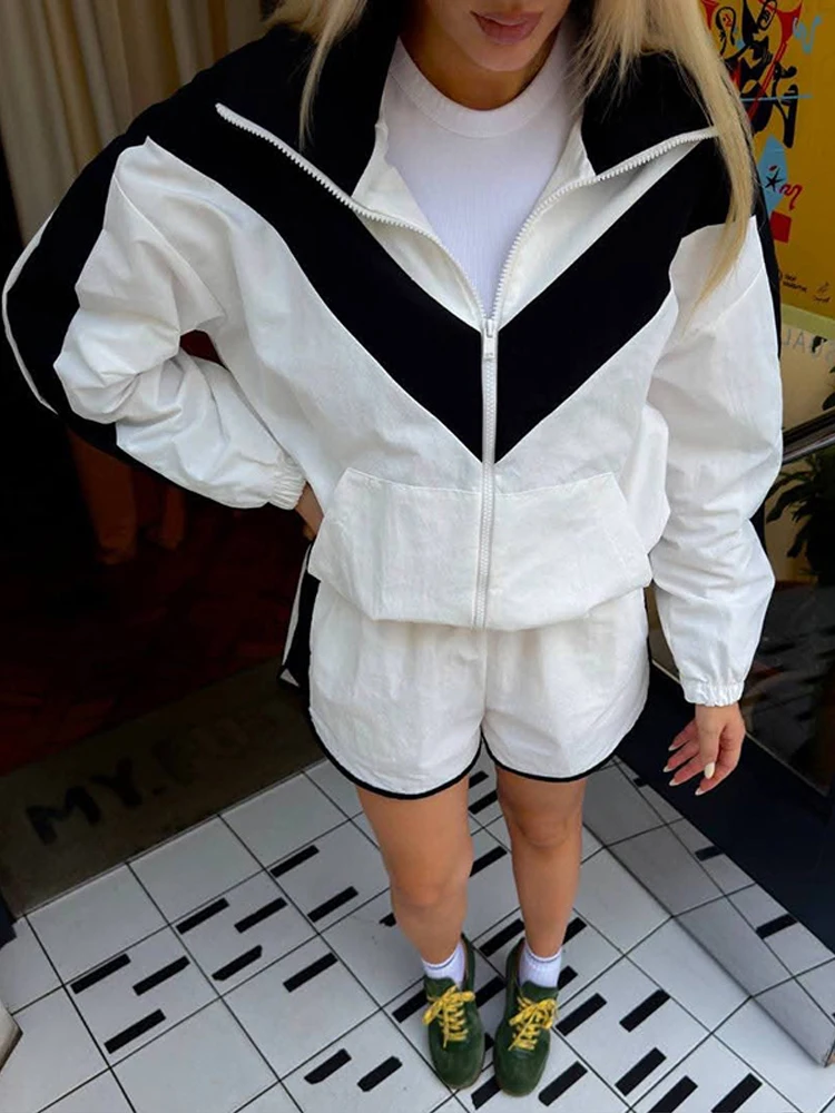 Ensemble de survêtement décontracté pour femme, coupe-vent bleu marine à rayures chevron, veste courte zippée et short à bordure contrastante, idéal pour le sport quotidien, le jogging et le style urbain