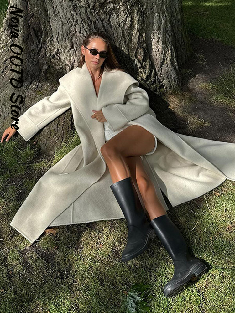 Manteau long en laine élégant à col châle et lacets pour femme, avec ceinture et revers, épais, collection automne-hiver 2026, chic et tendance