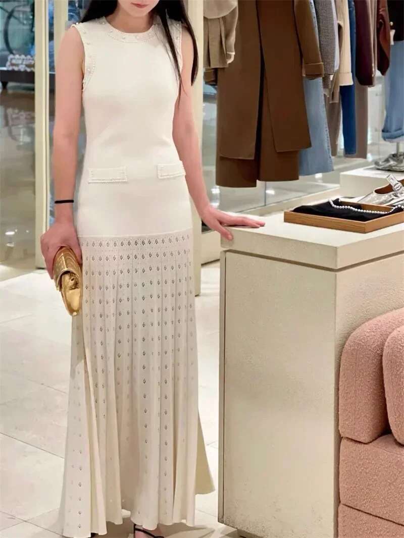 Perles décorées femmes col rond sans manches épissage tricoté robe pull élégant ou court tricoté 2025 printemps nouvelles femmes P8QA