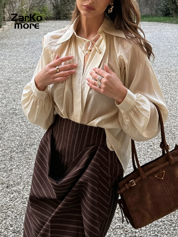 Ensemble chic chemise et jupe pour femme, col à revers ample, décolleté en V profond, manches longues, chemise transparente à lacets, jupes irrégulières à rayures, costumes 2026