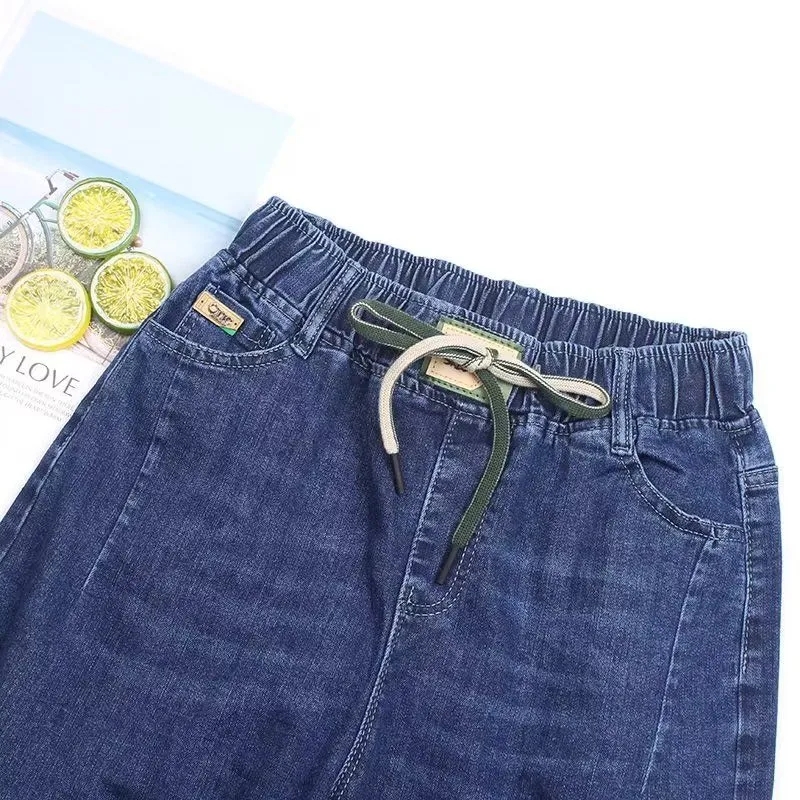 Jean pour femme Streetwear Printemps Automne 2026 Nouveau Pantalon Harun élastique taille haute en denim décontracté à poches coupe 7/8