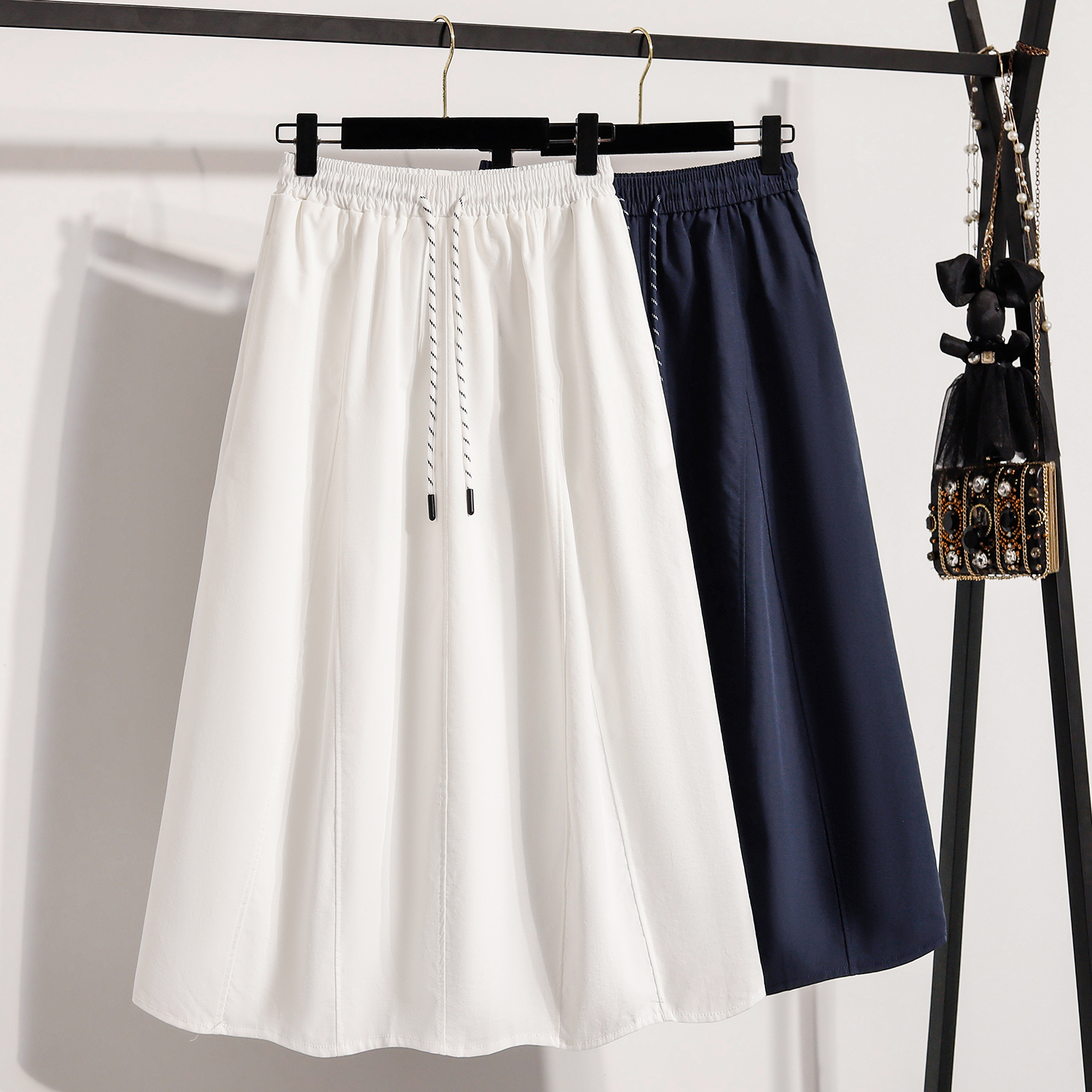 Style coréen décontracté polyvalent jupe longue grande taille jupes femmes 2026 printemps nouvelle mode haute taille élastique une ligne jupe