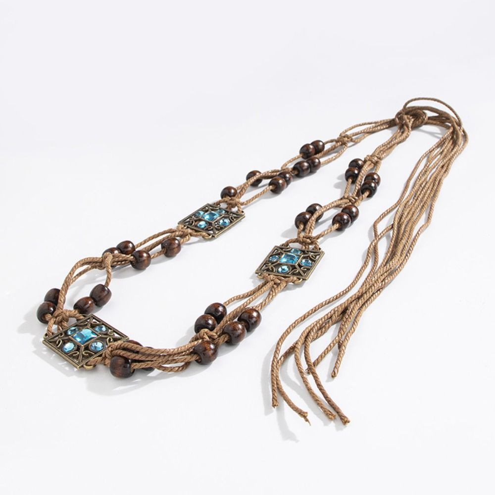 Chaîne de taille tressée bohème tendance, ceinture rétro pour robe et jupe, accessoire en tissu, ceinture à pompons de style ethnique pour femme