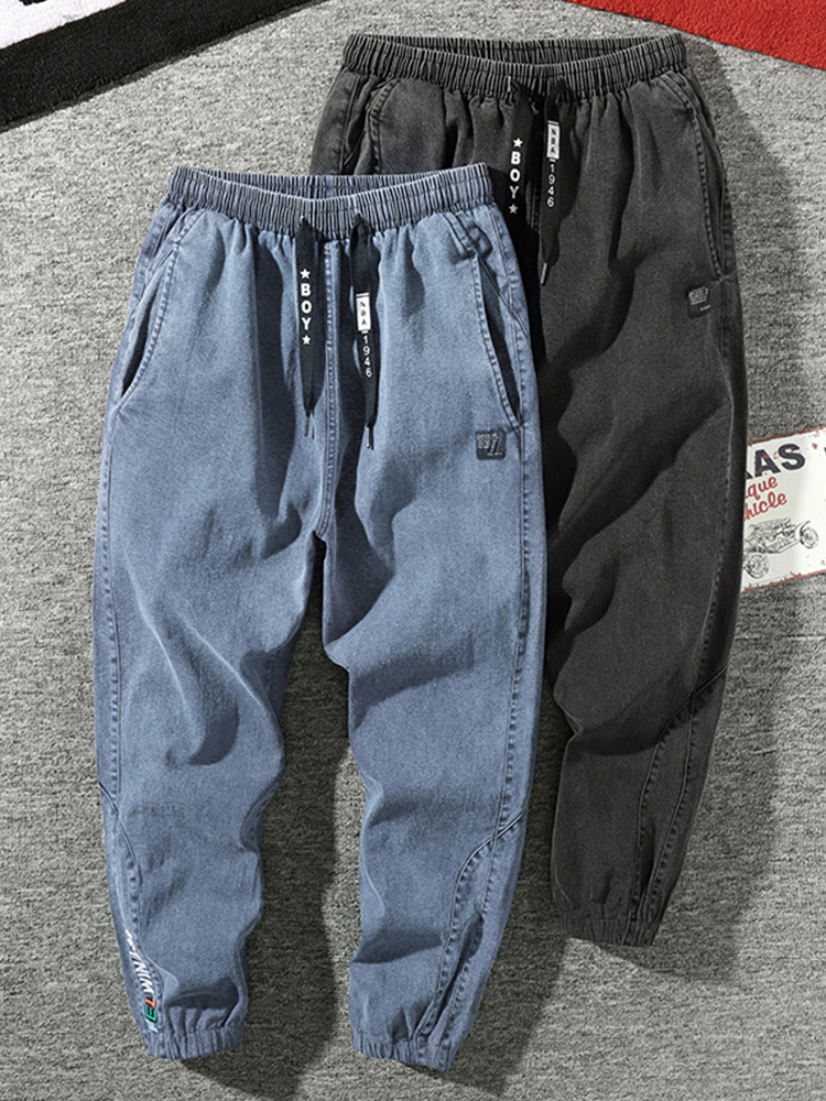 Jean de jogging grande taille pour hommes 6XL 7XL 8XL Streetwear noir bleu pantalon Cargo en Denim décontracté coton extensible jean conique pantalon Baggy