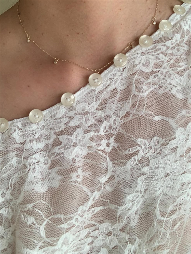 Femmes dentelle haut élégant femmes dentelle broderie haut col rond manches courtes boutons solide été pure T-shirt Clubwear
