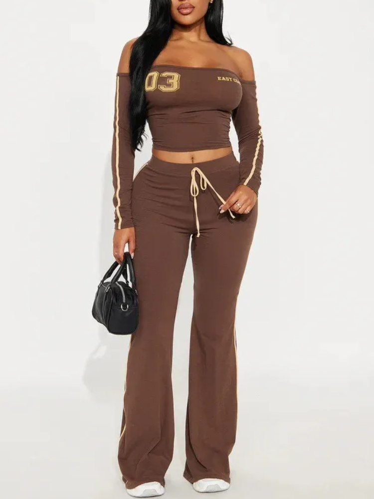 Hot girl fashion tendance costume longueur latérale irrégulière pantalon à manches longues hors épaule vêtements pour femmes printemps et été