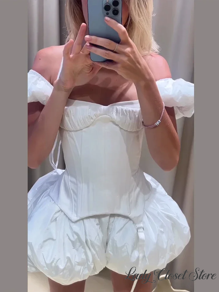 Ensemble jupe et haut sexy pour femme, couleur unie, col bateau, gilet à lacets ajusté à la taille, jupes plissées moulantes, tenue chic été 2026